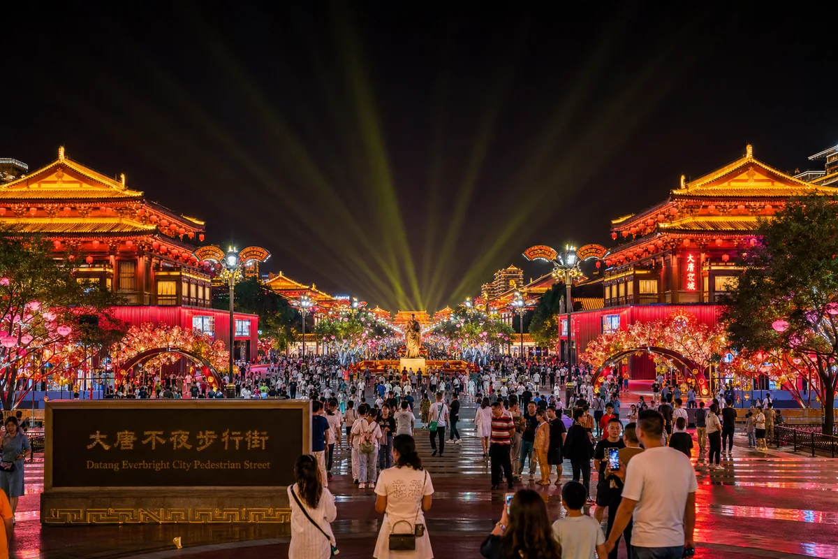 Datang Everbright City illuminated at night with Tang-style buildings in Xi'an