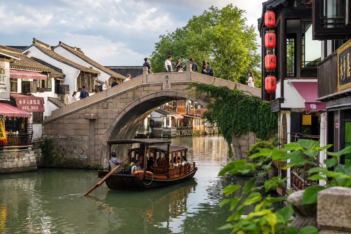 Stone bridge and canal boats in Zhujiajiao water town near Shanghai