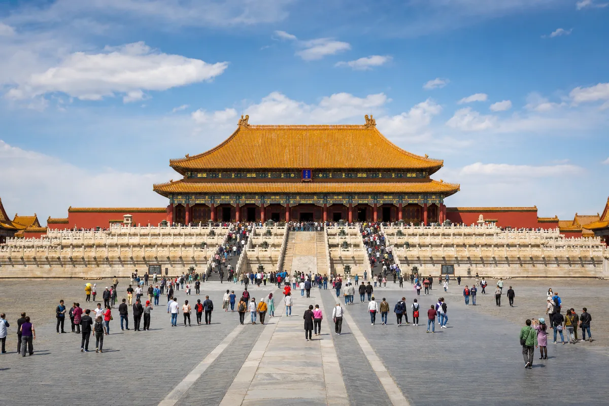 Forbidden City courtyard in Beijing with golden roofs and red walls