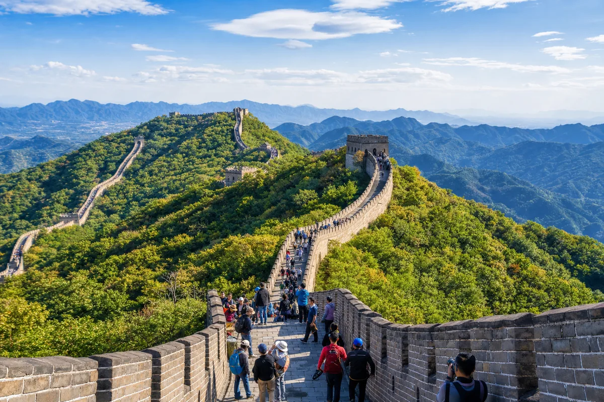 Great Wall of China at Mutianyu winding over forested mountain ridges