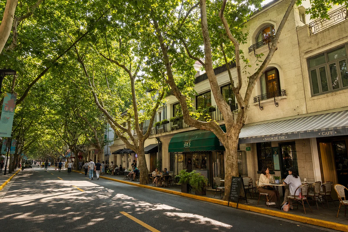 Tree-lined street in Shanghai's former French Concession with cafes