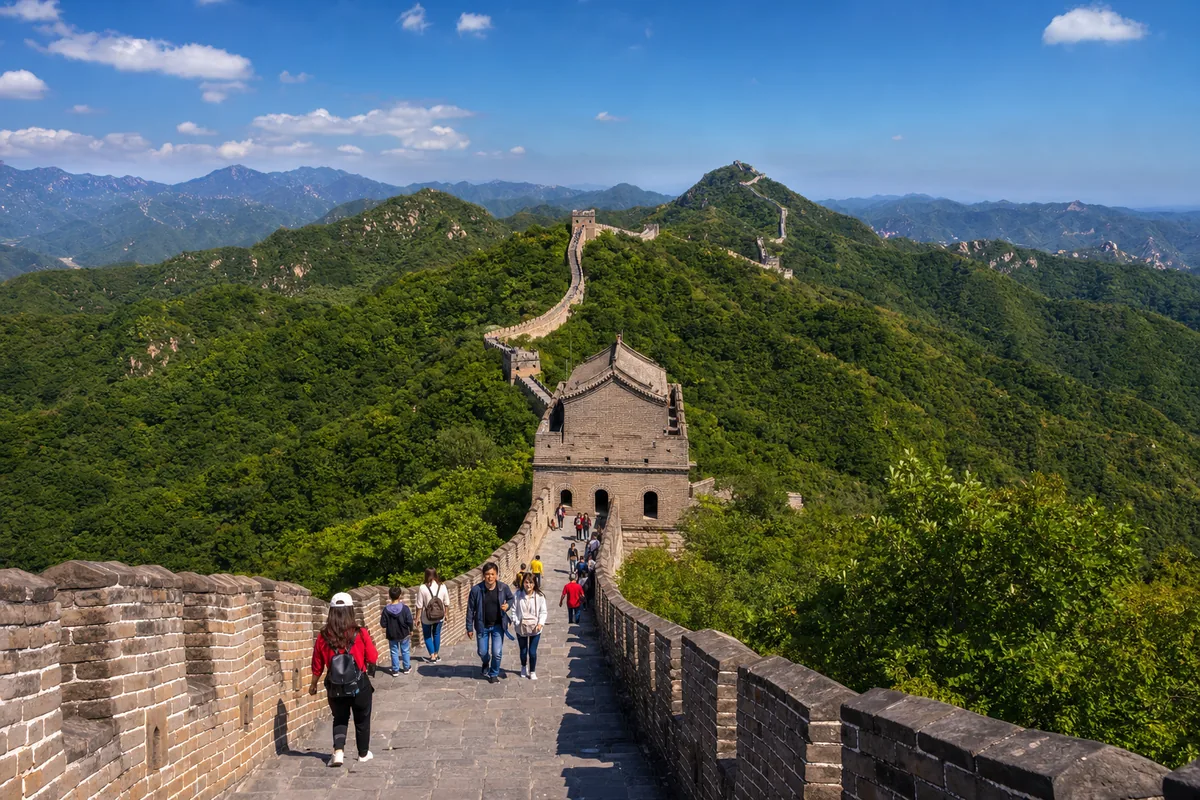 The restored Great Wall at Mutianyu winding over green mountain ridges