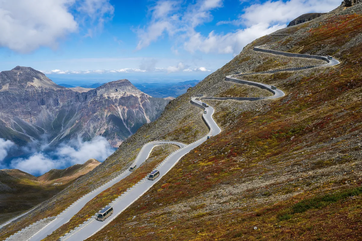 Winding switchback shuttle road climbing to the Heaven Lake viewpoint from the Changbaishan North Gate