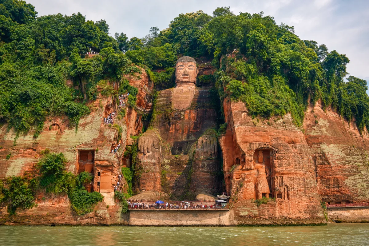 The 71-meter Leshan Giant Buddha carved into a cliff above the river junction near Chengdu