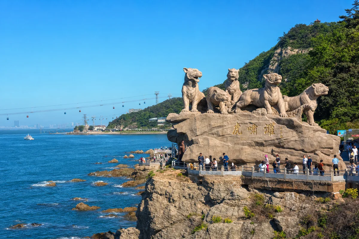 Tiger Beach rocky coastline and tiger sculpture in Dalian