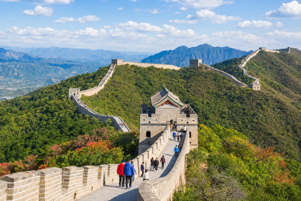 The Great Wall at Mutianyu winding along forested mountain ridges near Beijing