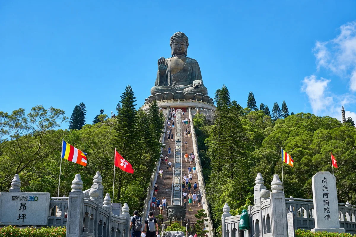 Tian Tan Big Buddha bronze statue atop steps on Lantau Island