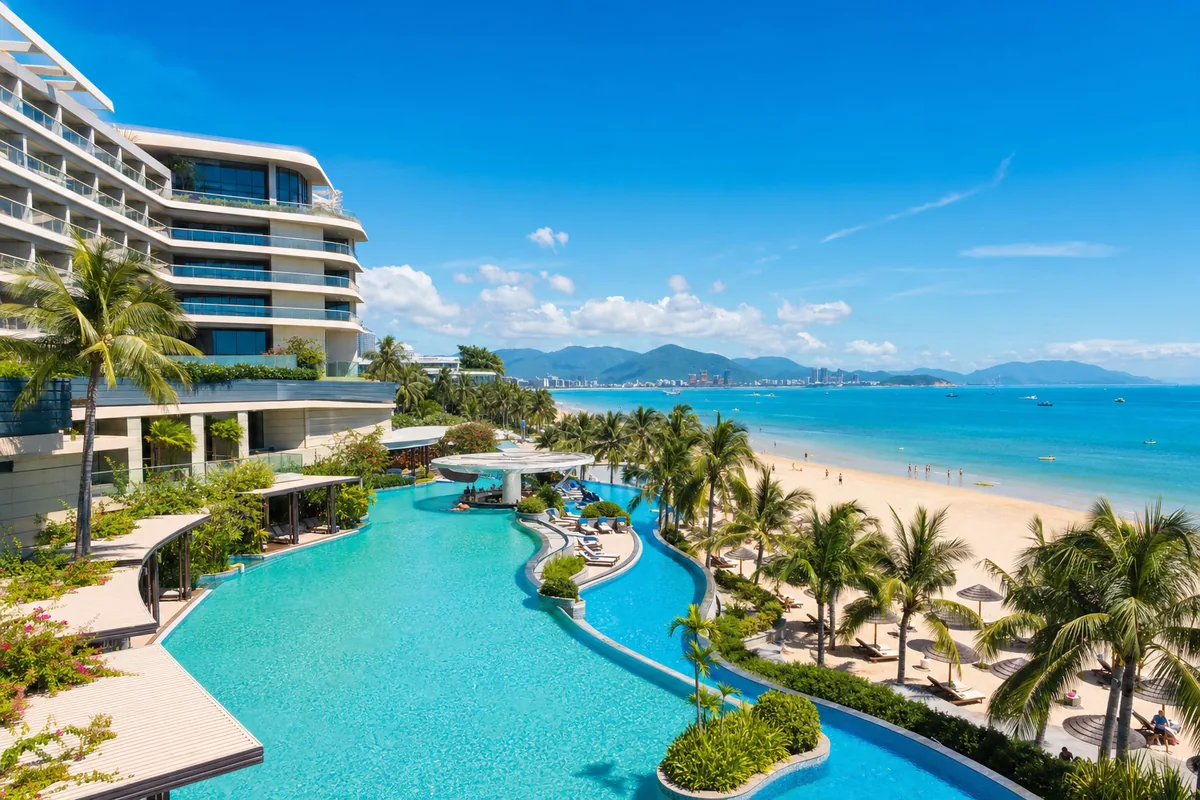 Beachfront luxury resort in Sanya's Haitang Bay with ocean-view rooms and a tropical coastline
