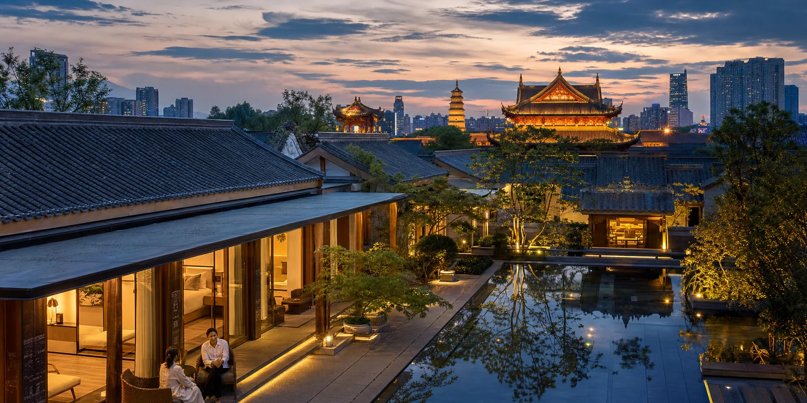 Quiet luxury courtyard hotel in Chengdu at dusk blending traditional Chinese architecture with modern design