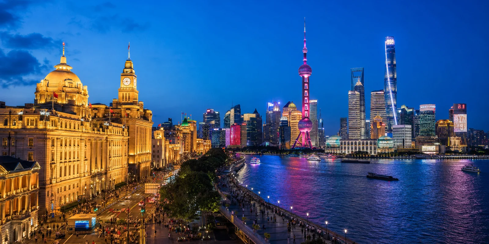 Shanghai Bund waterfront at dusk with historic buildings and the lit Pudong skyline across the Huangpu River