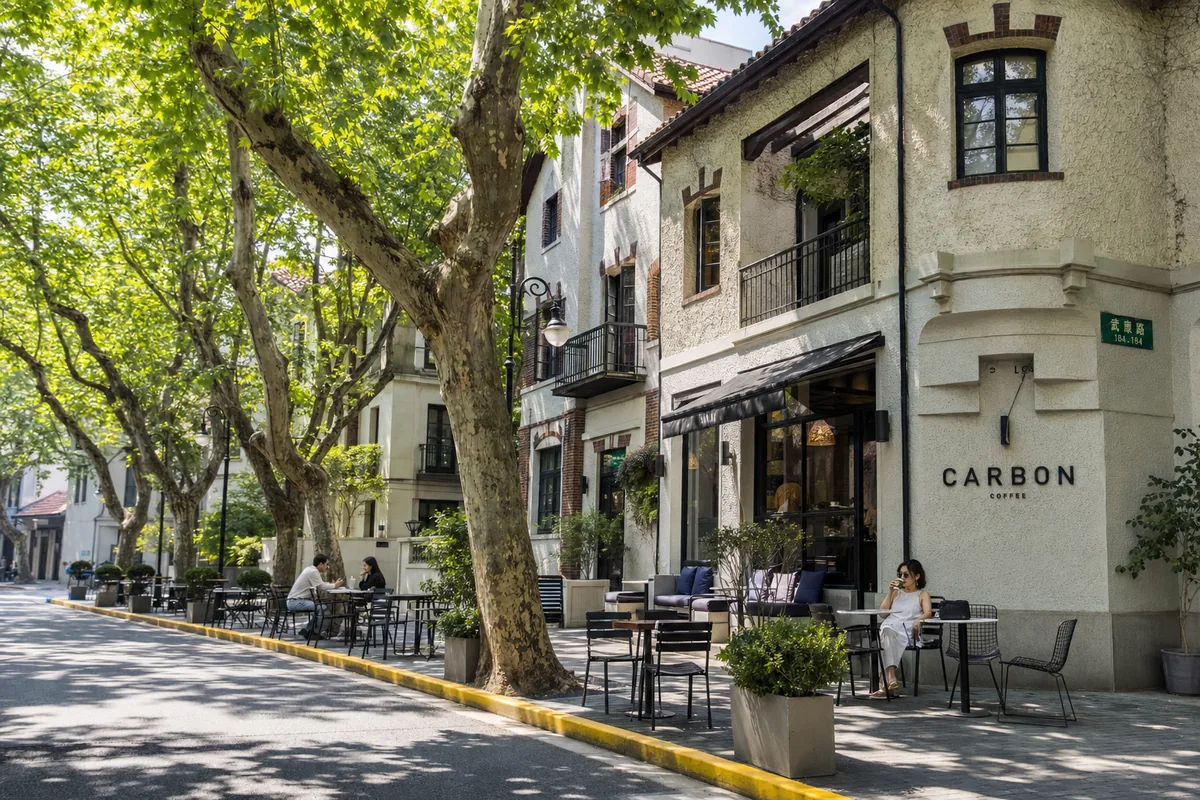 Sidewalk cafe under plane trees in Shanghai's former French Concession