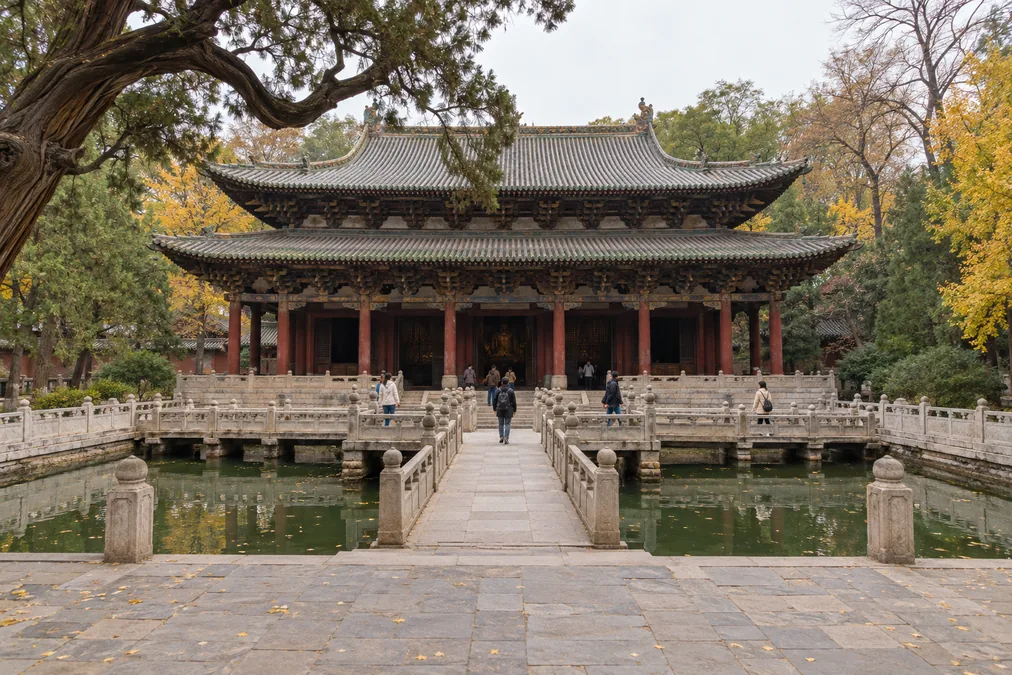 The Hall of the Holy Mother at Jinci in Taiyuan, with the cross-shaped stone bridge over the pond in front