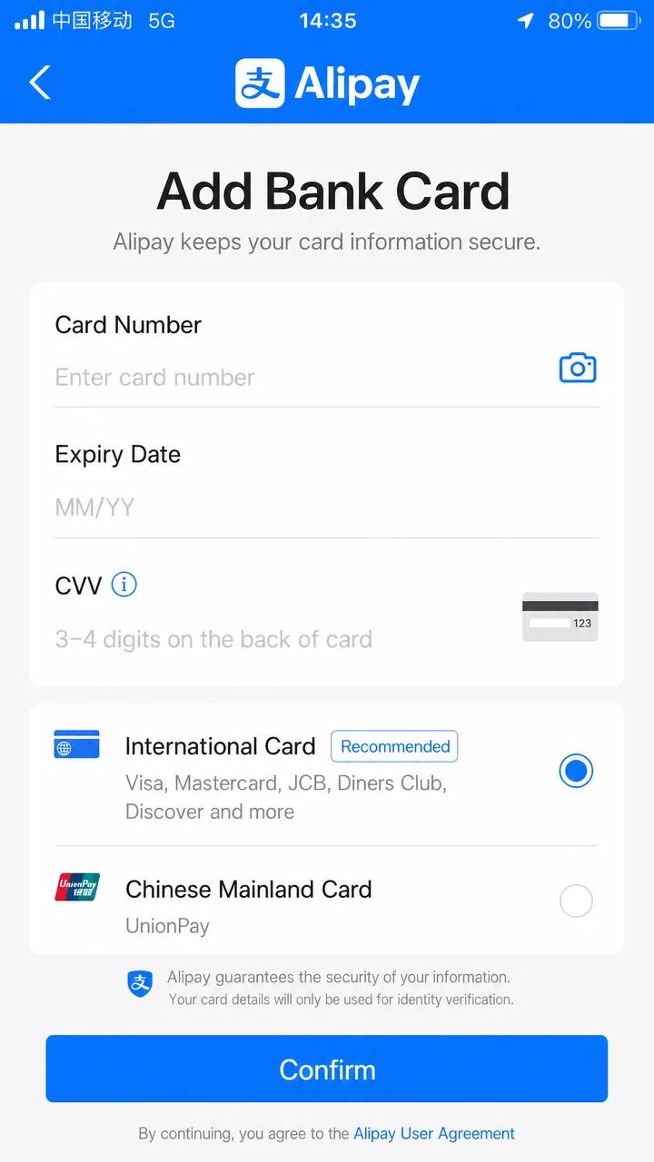Smartphone showing the Alipay screen for linking a foreign bank card
