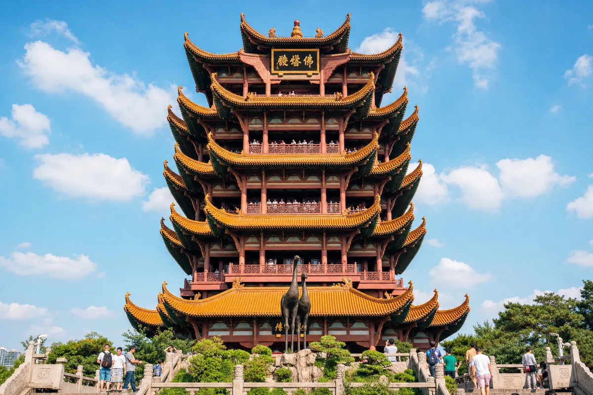 Close-up of the Yellow Crane Tower's tiered roofs and yellow glazed tiles
